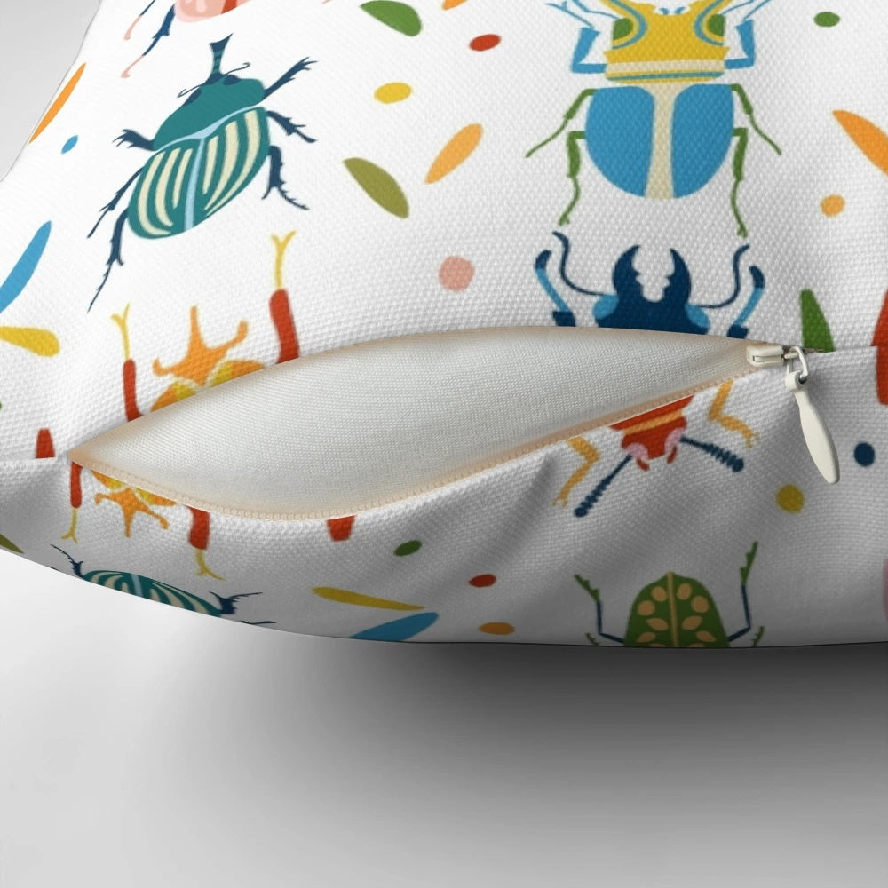 Colourful beetles print on a decorative pillow, showcasing the diverse and whimsical patterns of nature's insects.