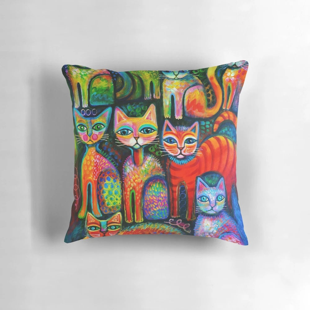 Colourful and whimsical throw pillow featuring a design of playful kittens in a rainbow of colours
