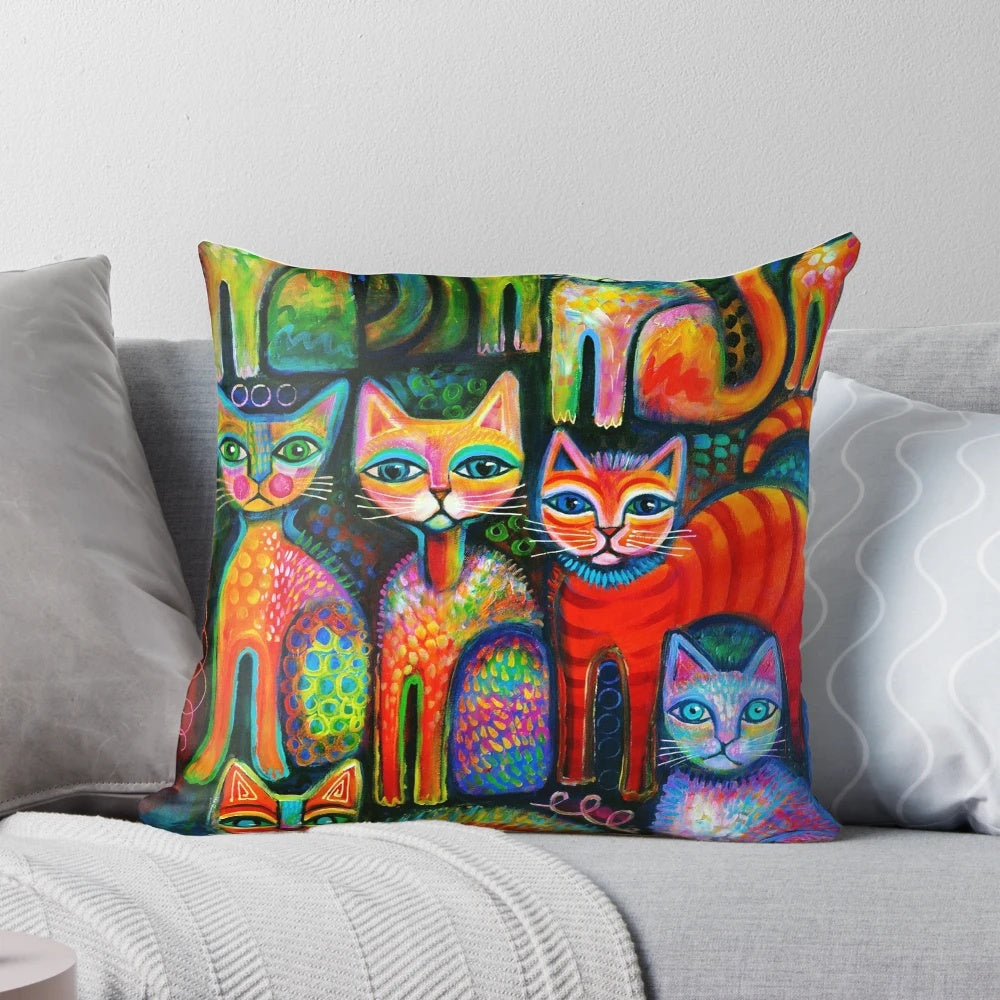 Colourful and whimsical throw pillow featuring a design of playful kittens in a rainbow of colours