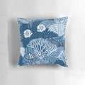Colorful coral reef design on a classic blue pillow