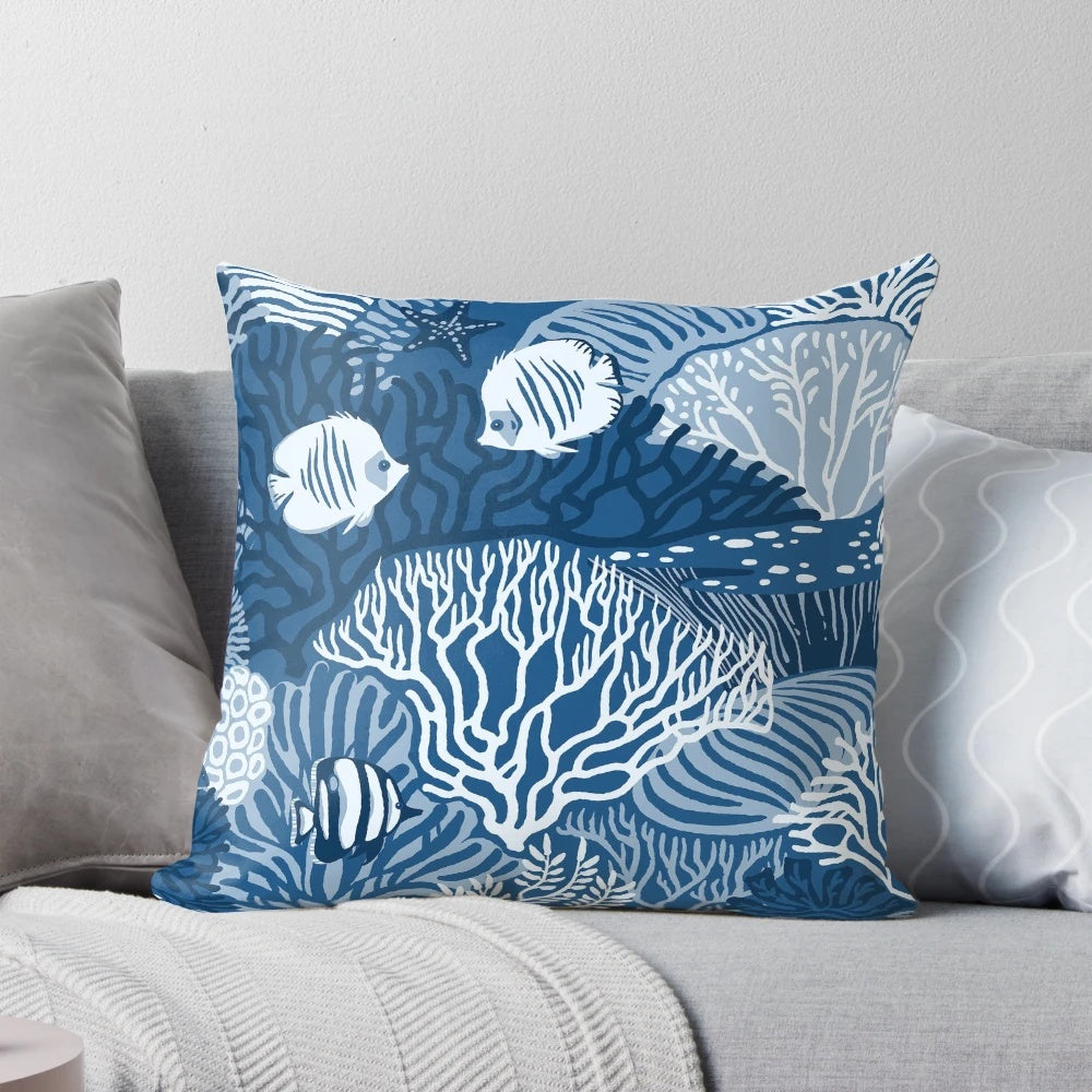 Colorful coral reef design on a classic blue pillow