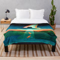 Colorful plush blanket featuring an alien cat design in a cosmic, galaxy-inspired pattern