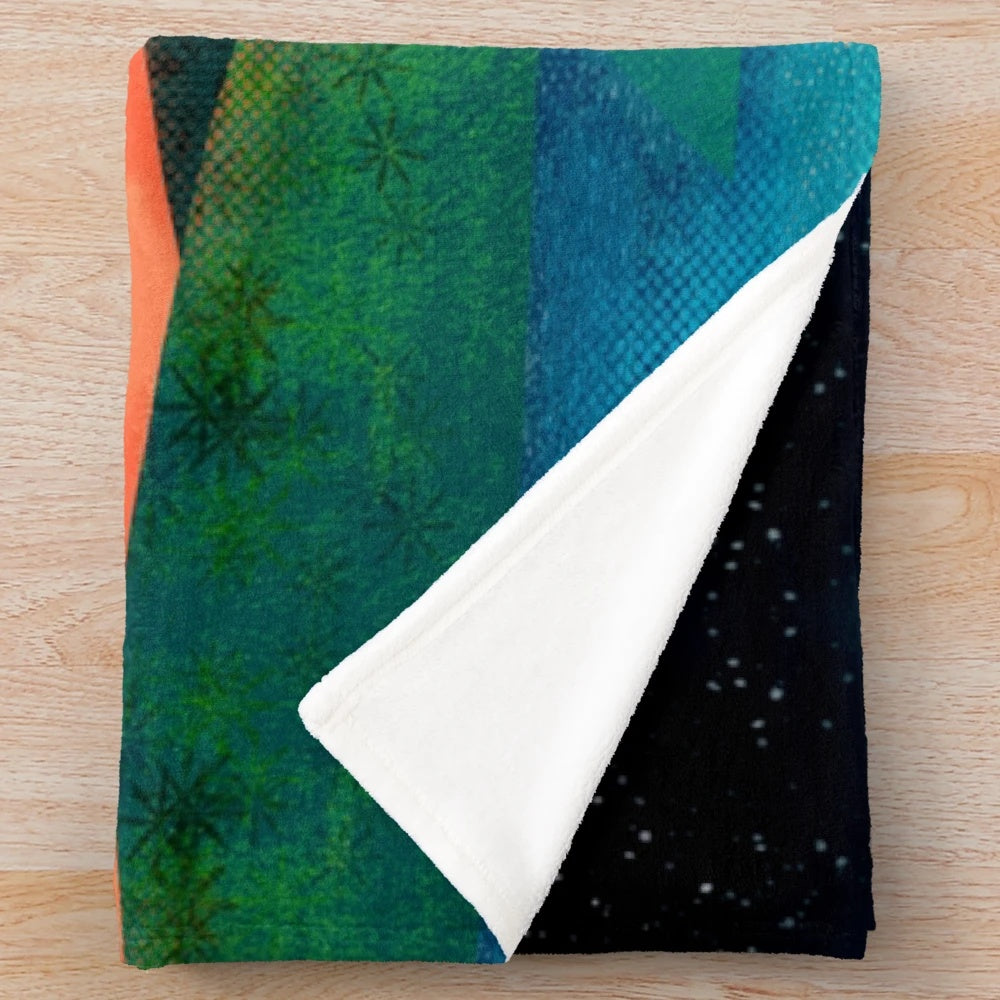 Colorful plush blanket featuring an alien cat design in a cosmic, galaxy-inspired pattern