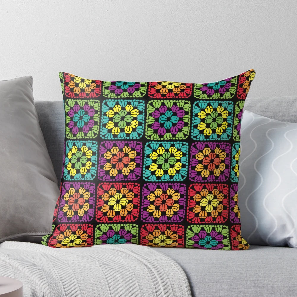 Crochet granny square pillow in colorful yarn, handmade with traditional crochet technique