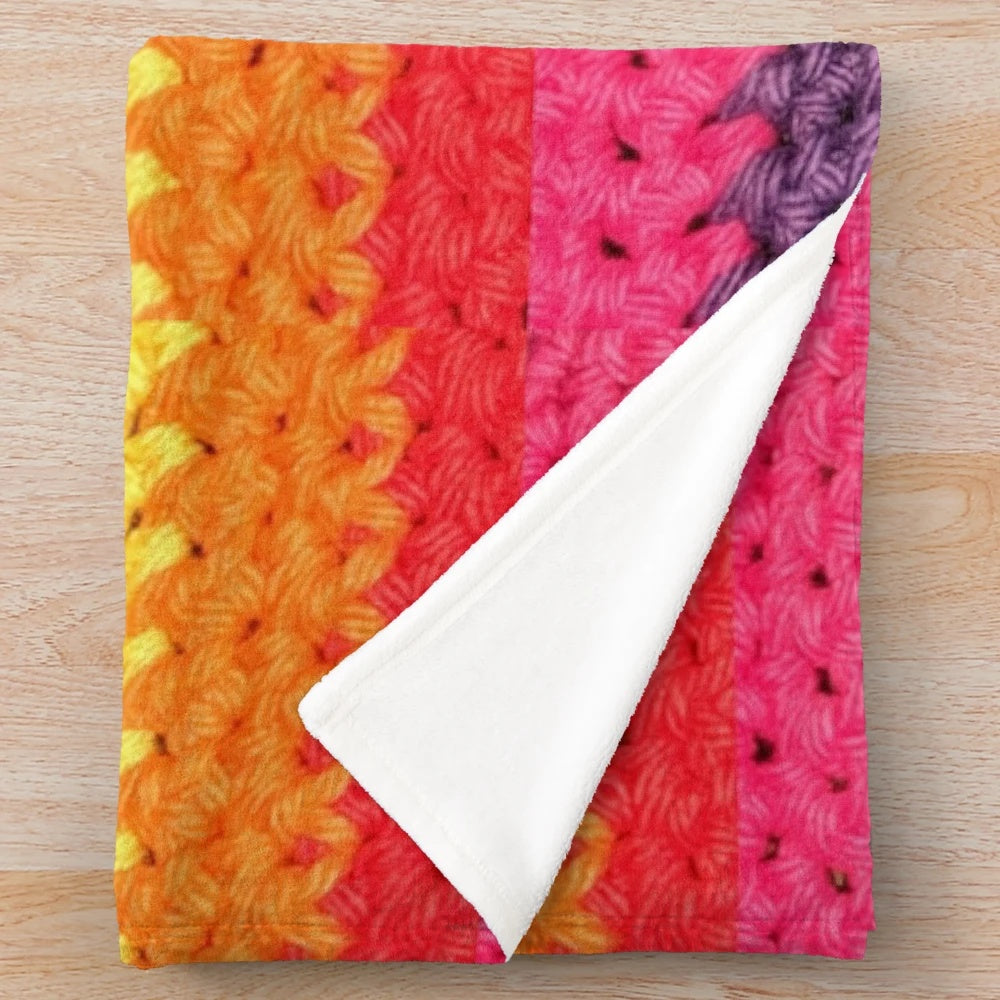Colorful crochet rainbow plush blanket