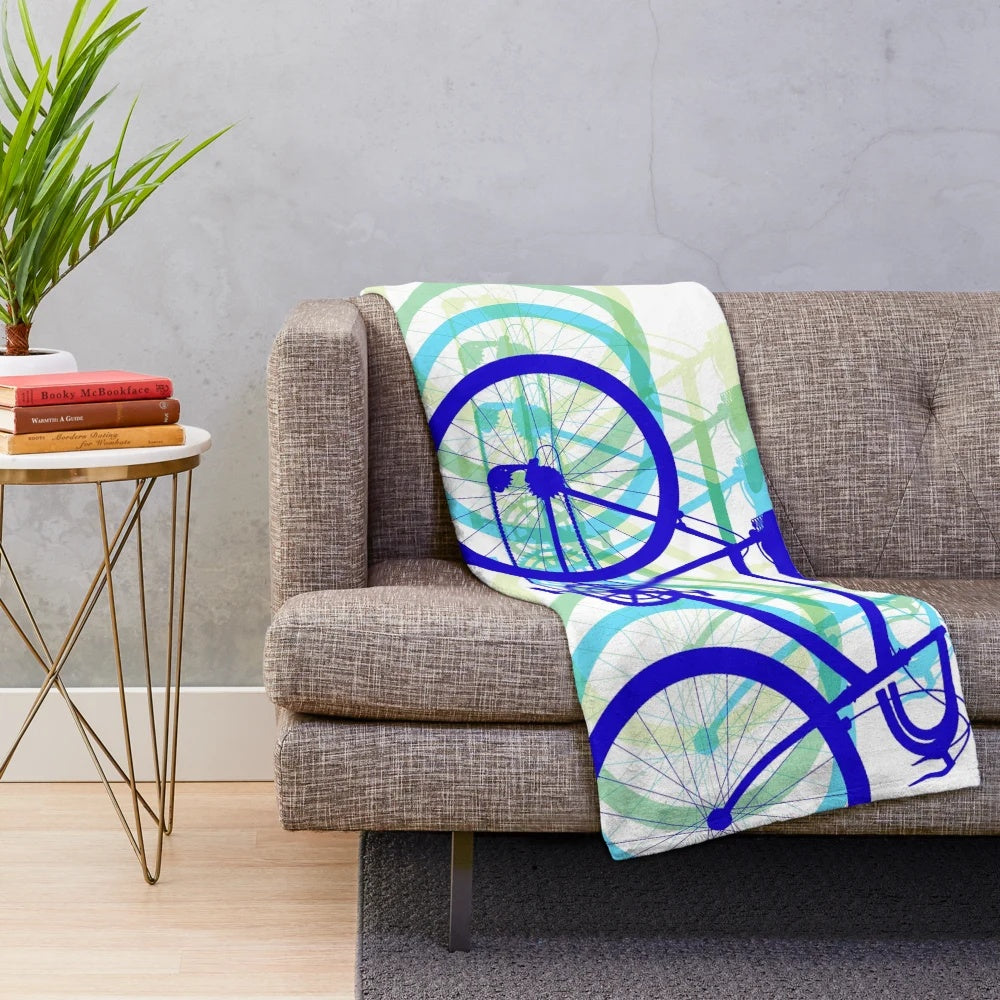 Cycling inspired plush blanket with vibrant 3D color design