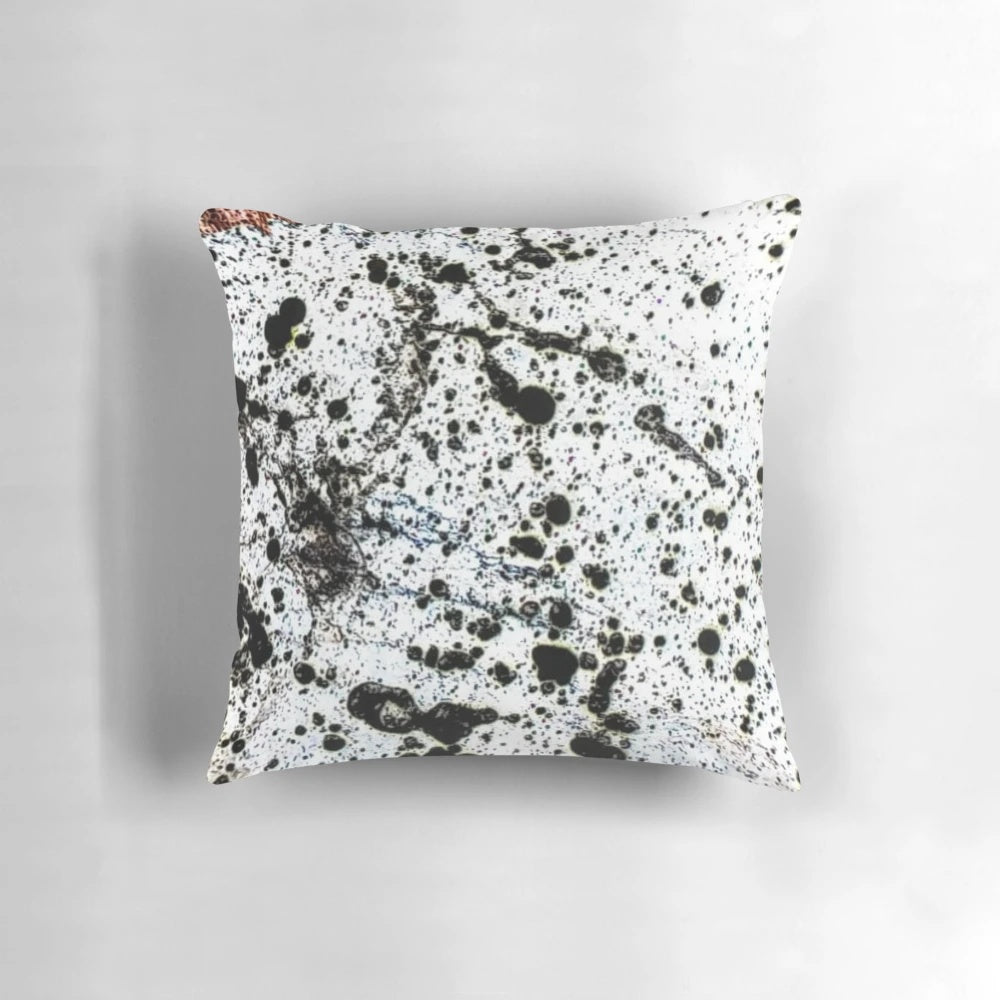 Dalmatian Pollock-inspired throw pillow with abstract, dripping paint patterns