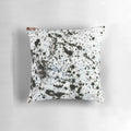 Dalmatian Pollock-inspired throw pillow with abstract, dripping paint patterns
