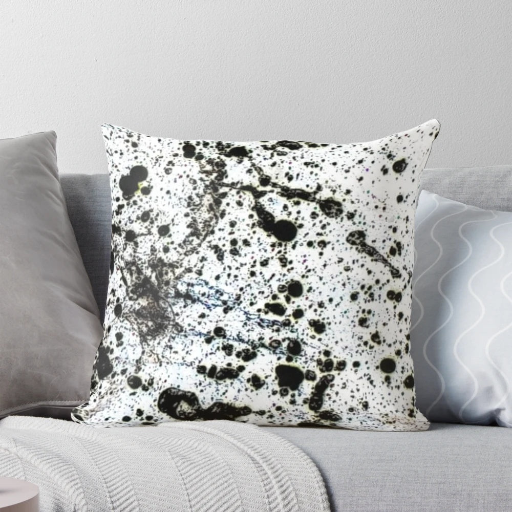 Dalmatian Pollock-inspired throw pillow with abstract, dripping paint patterns