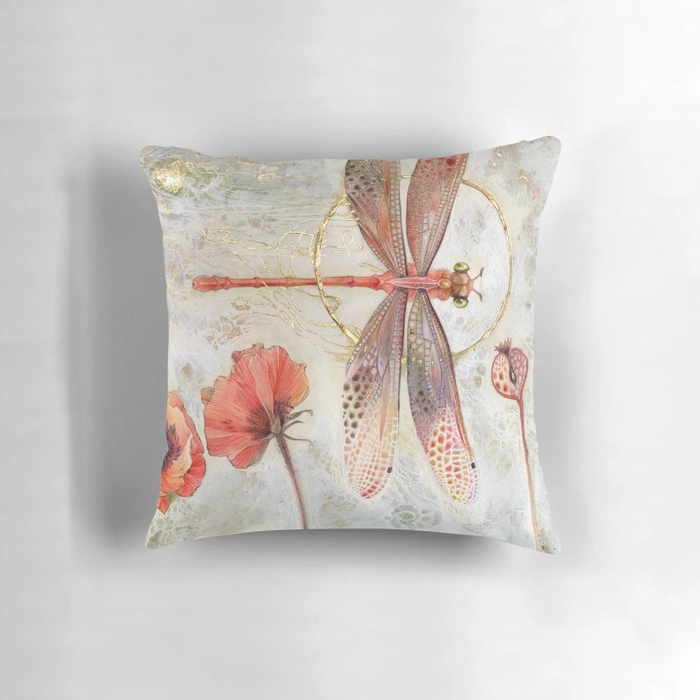 Vibrant red jewel damselfly with delicate wings in a stained glass design on a decorative throw pillow