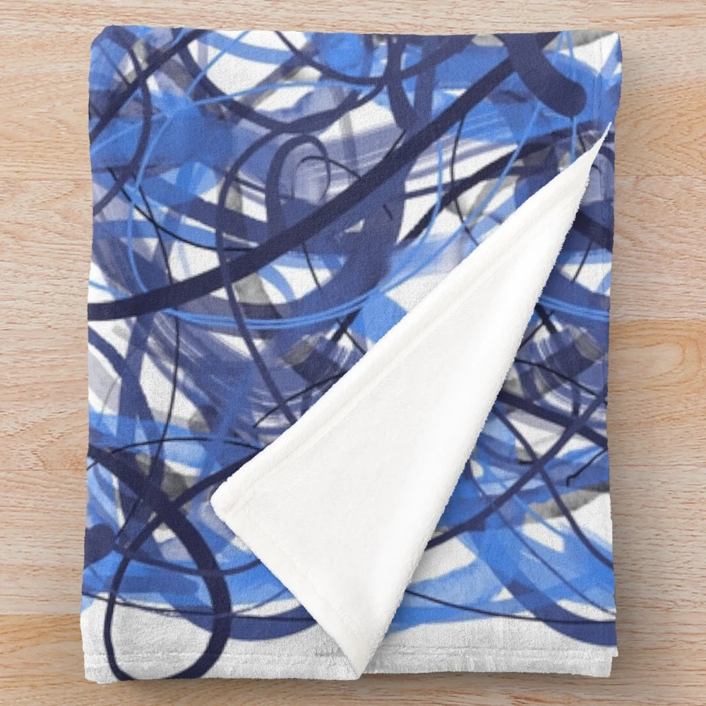 Plush blanket with digital symmetry design in blue tones
