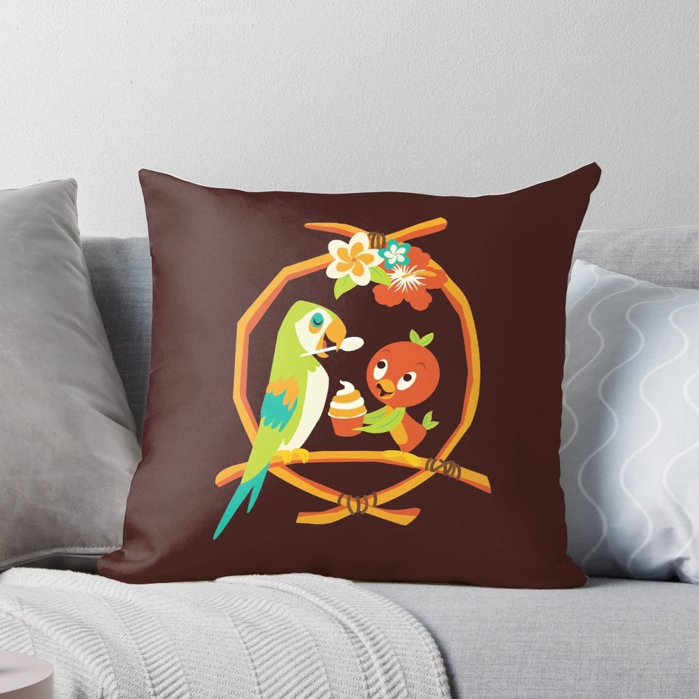 Colorful pillow featuring an orange bird and tiki room design, inspired by the Sunshine Tree Terrace at Walt Disney World.