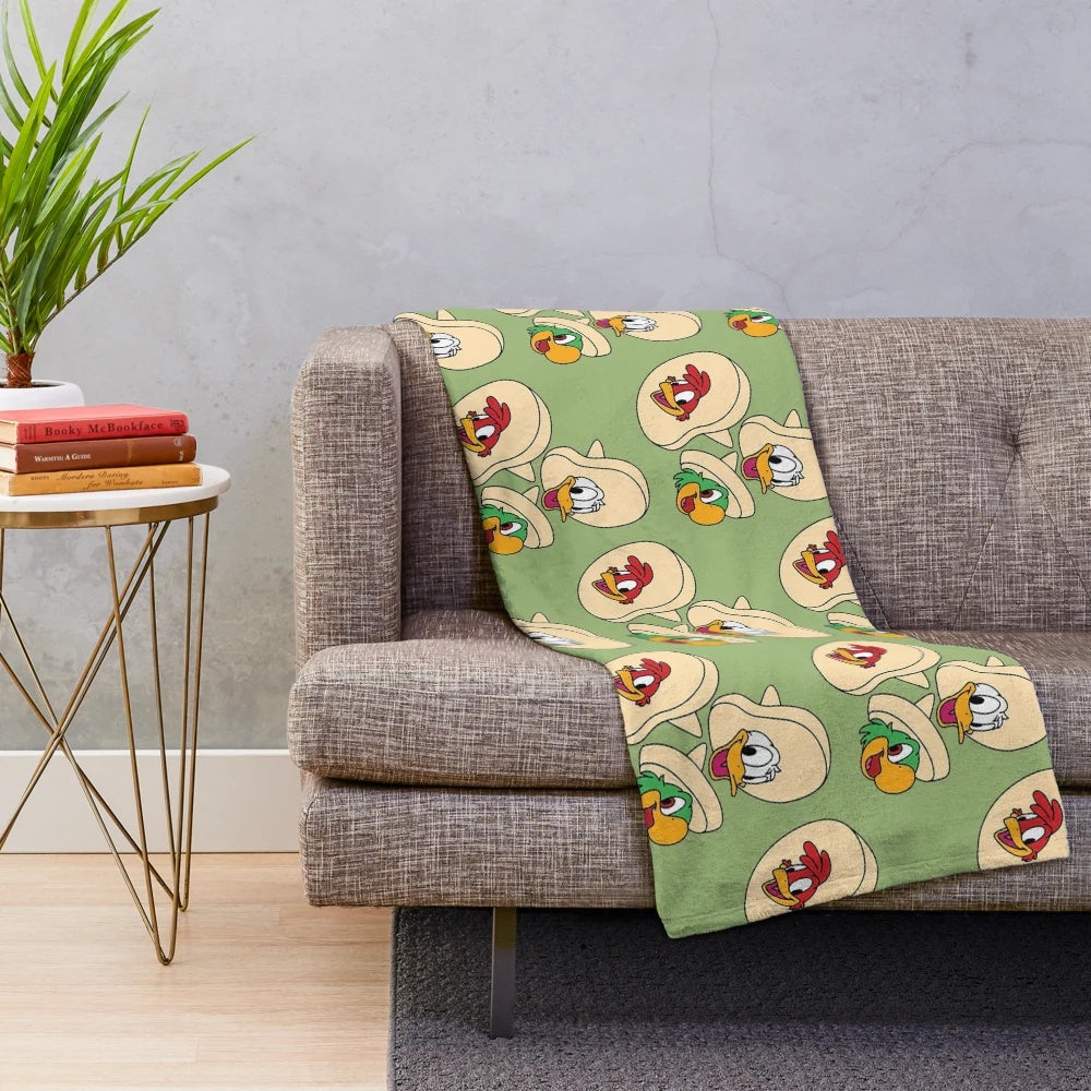 Colorful plush blanket featuring Disney's Three Caballeros characters