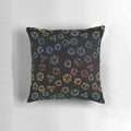 Colorful DnD dice pattern on a black background pillow