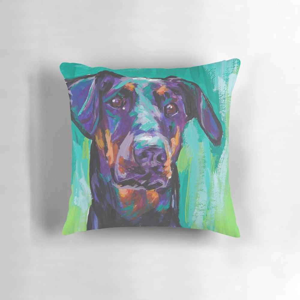 Bright and colorful pop art style Doberman Pinscher dog portrait on a decorative throw pillow.