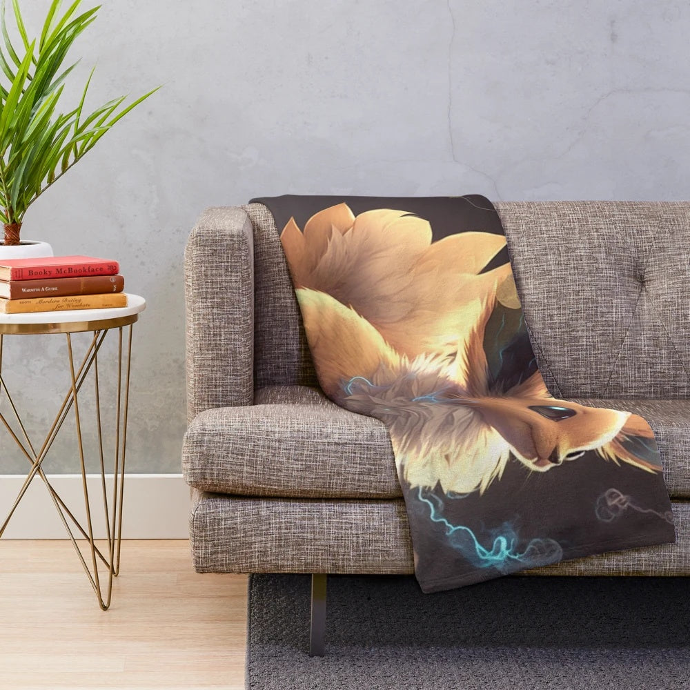 Colorful illustration of Eeveelution characters on a plush blanket