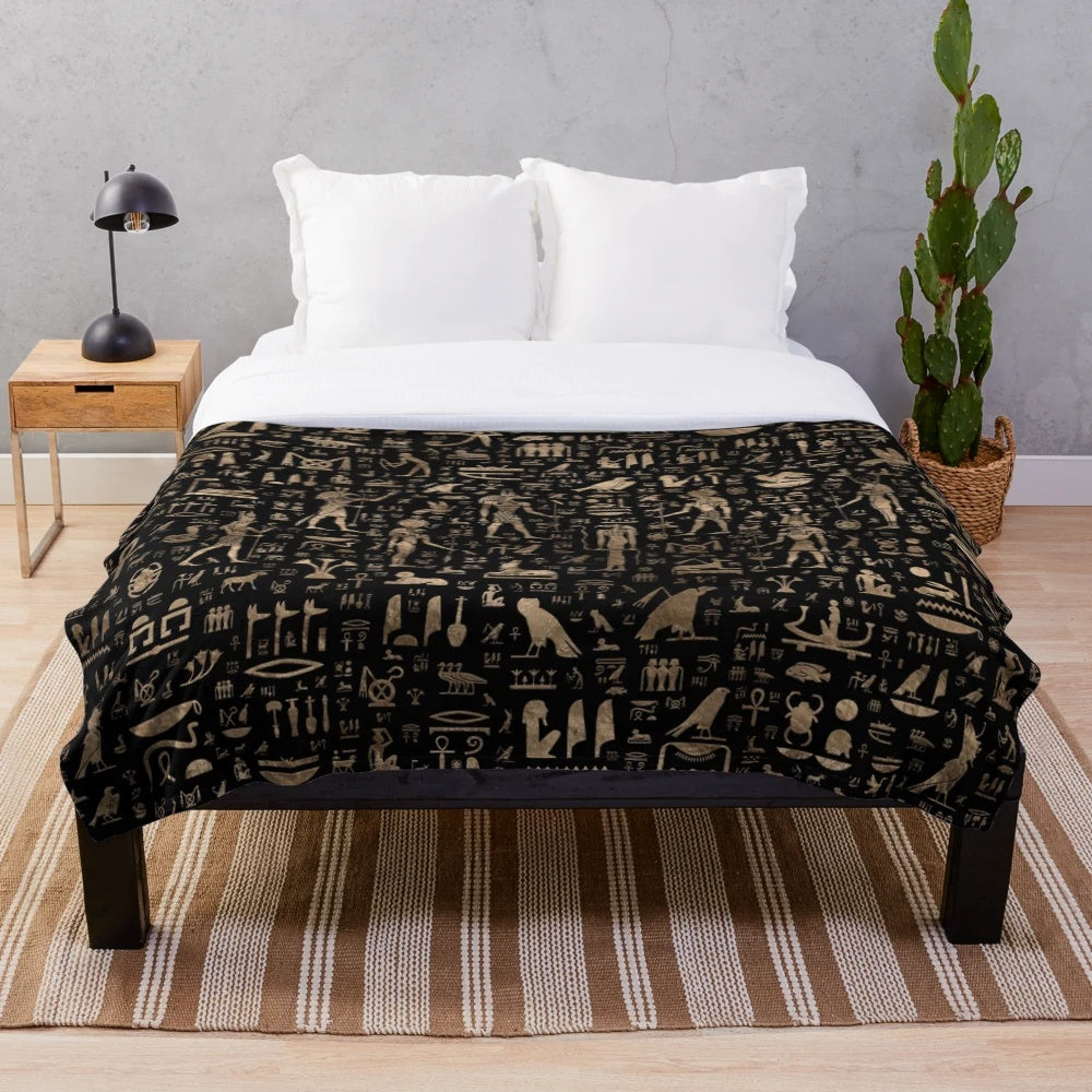 Plush blanket with ancient Egyptian hieroglyphic pattern and symbols