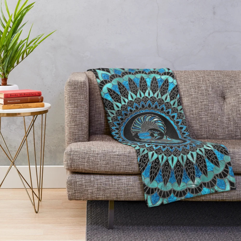 Gold and blue plush blanket with Egyptian scarab beetle design