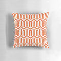 Coral orange pillow with an elegant Egyptian-inspired geometric pattern, perfect for 1920s and 1930s inspired home decor.