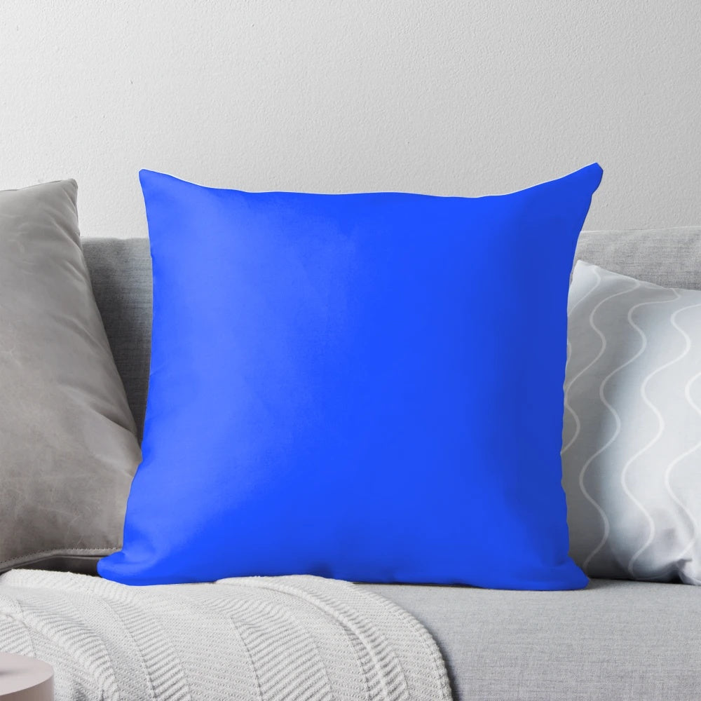 Vibrant electric blue pillow with a solid, matte finish for a sophisticated, modern decor accent.