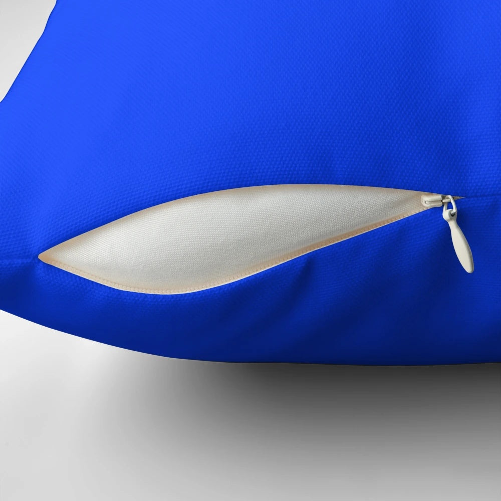 Vibrant electric blue pillow with a solid, matte finish for a sophisticated, modern decor accent.