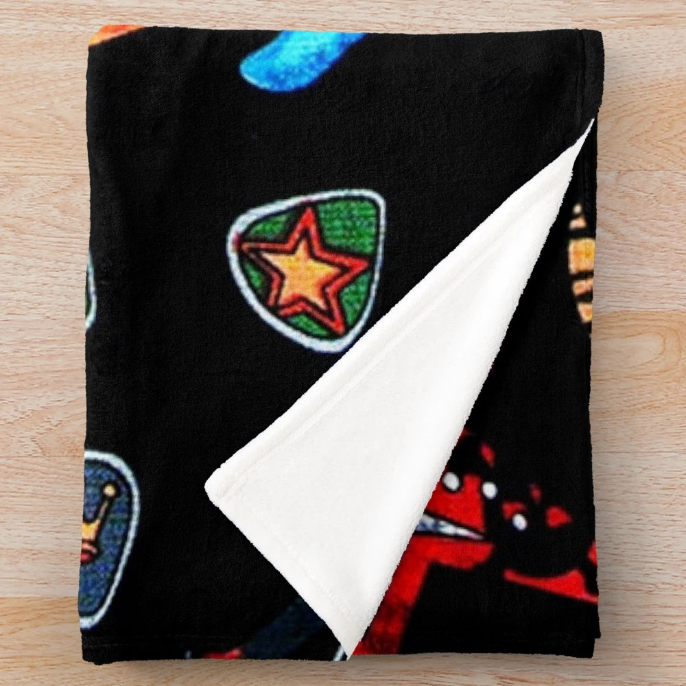 Plush blanket featuring a vibrant electric guitar design