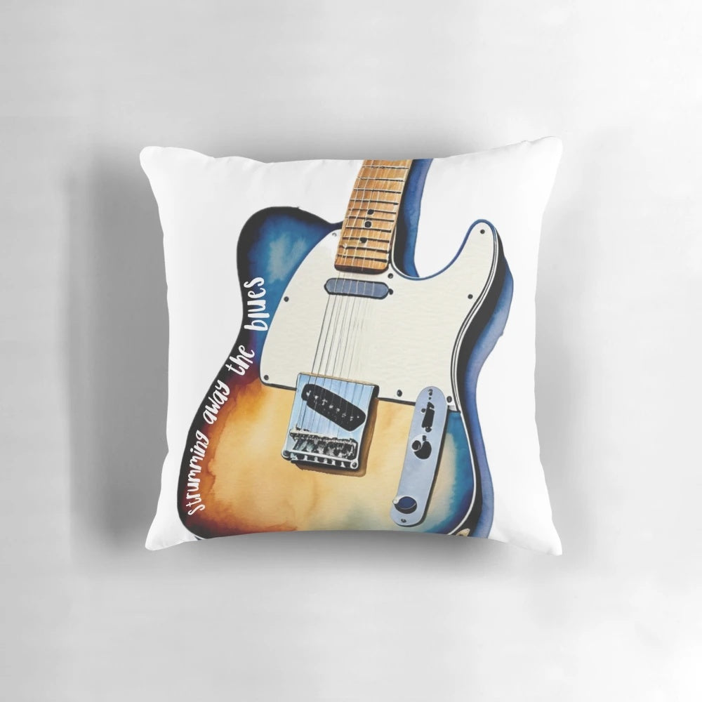 Colorful watercolor-style illustration of an electric guitar strumming the blues on a decorative pillow.