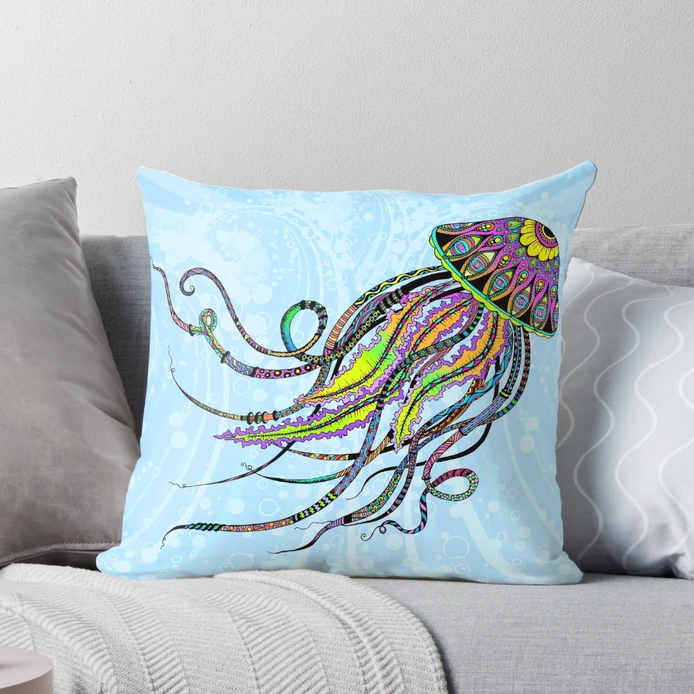 Colorful electric jellyfish pillow with neon tentacles, swirling patterns, and a doodle-like design.