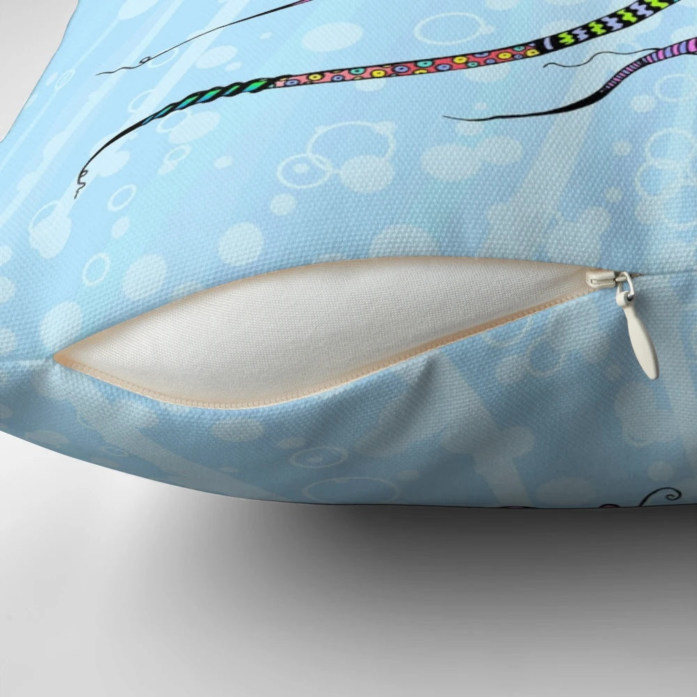 Colorful electric jellyfish pillow with neon tentacles, swirling patterns, and a doodle-like design.