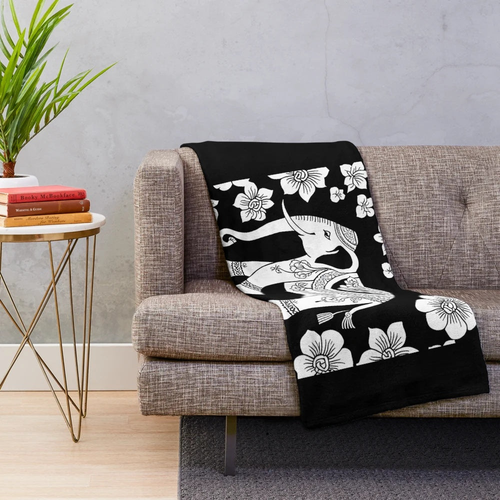 Colorful plush blanket with vibrant elephant parade design