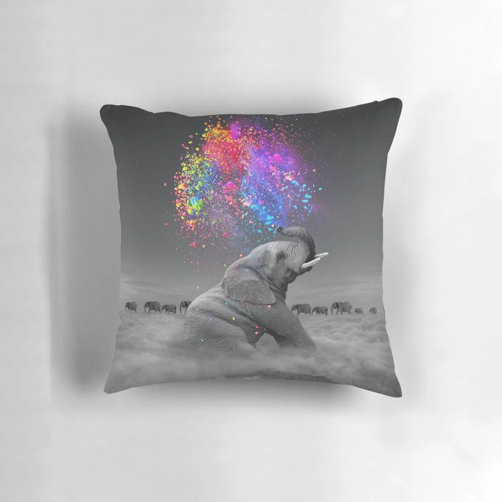 Colorful elephant-themed throw pillow featuring a rainbow design and nature elements