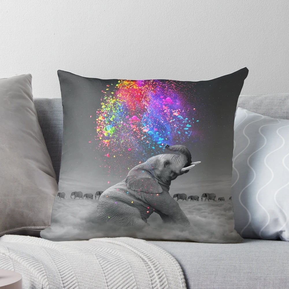 Colorful elephant-themed throw pillow featuring a rainbow design and nature elements