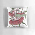 Closeup image of stunning pink eucalyptus mallee flowers on a decorative pillow.