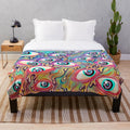 Colorful plush blanket featuring an eye-catching eyeball pattern design