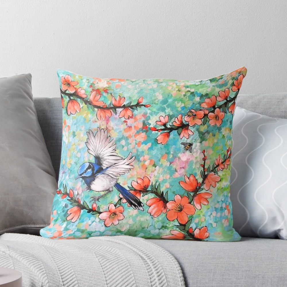 Colorful throw pillow featuring a detailed illustration of a vibrant fairy wren bird against a nature-inspired background.