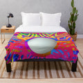 Colorful and whimsical plush blanket with fantasy, abstract, and surreal patterns