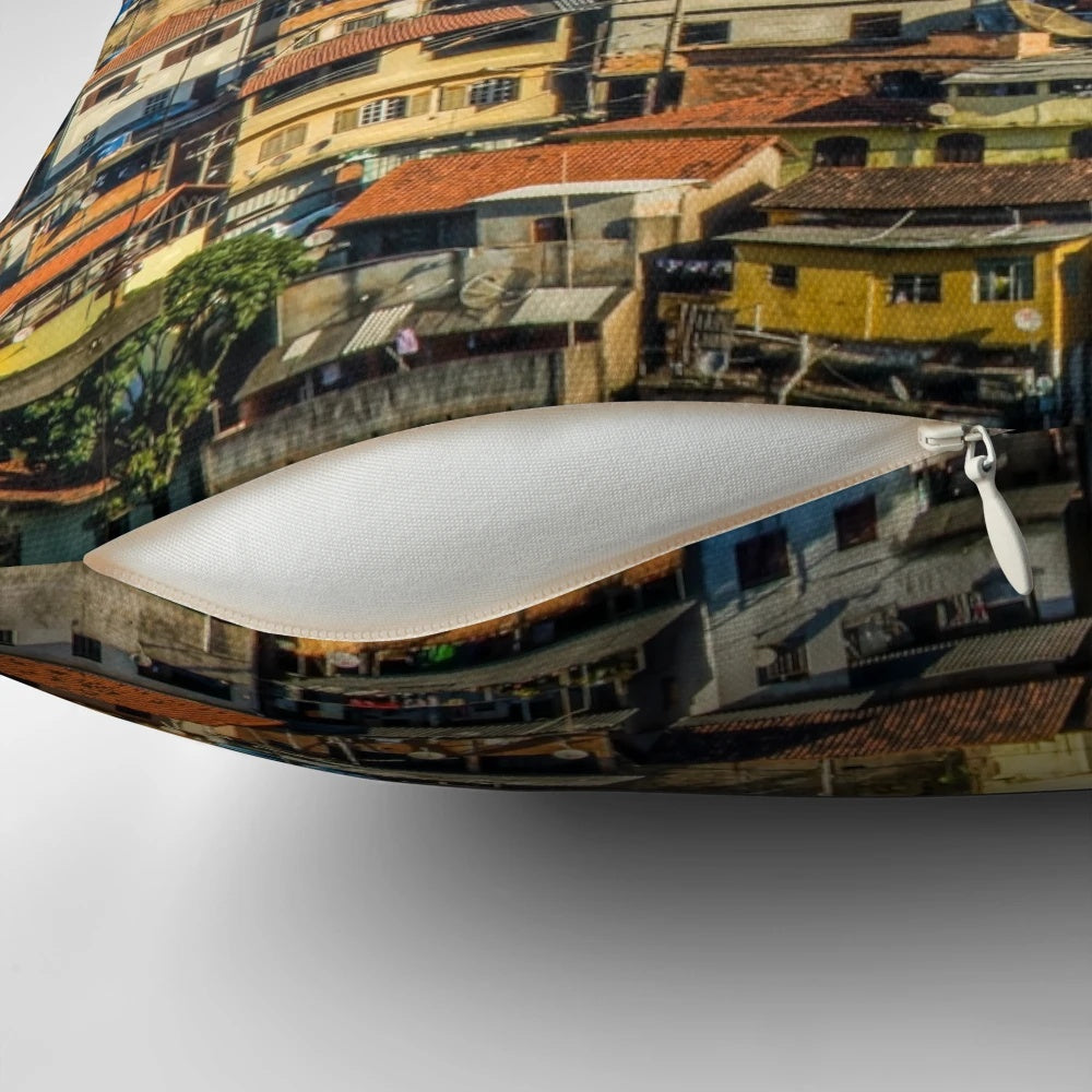 Colorful pillow featuring a vibrant favela scene from Brazil, showcasing the country's unique architecture and street style.