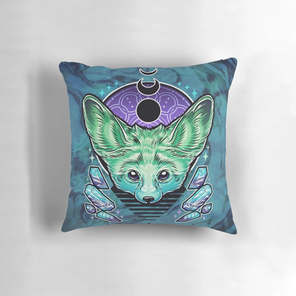 A vibrant pillow featuring a fennec fox design with neon crystals and sacred geometry elements.
