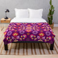Fiesta folk inspired purple plush blanket with colorful seamless pattern