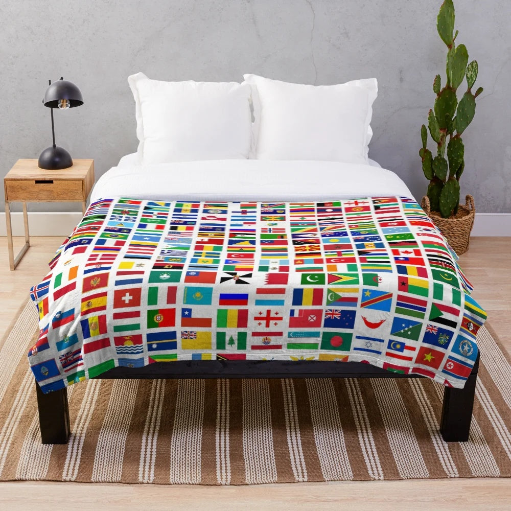 Colorful flags of the world printed on a soft plush blanket