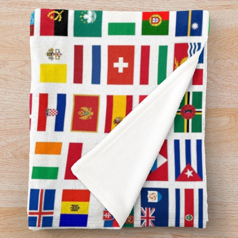 Colorful flags of the world printed on a soft plush blanket