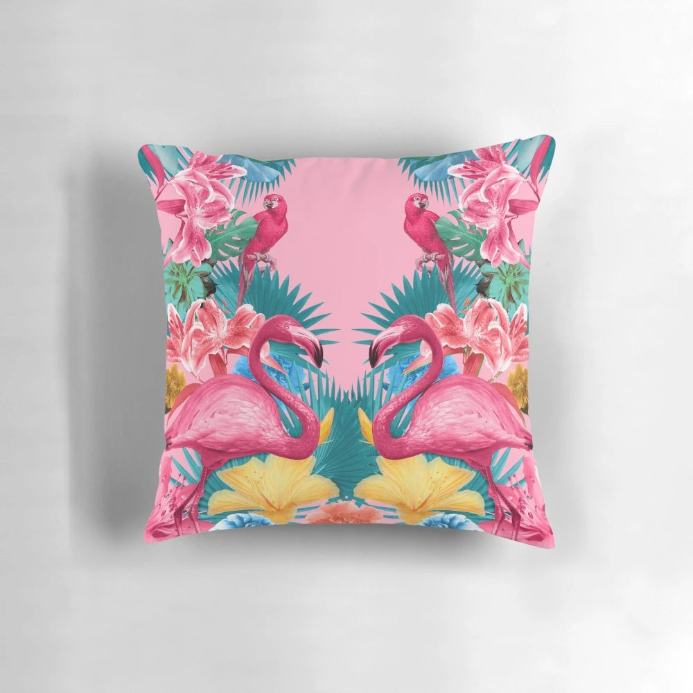 Colorful flamingo and tropical garden pattern printed on a plush pillow for home decor.