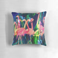 Colorful flamingo, floral, and tropical leaf design on a decorative throw pillow