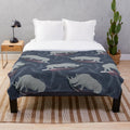 Colorful plush blanket with abstract floating white rhino design