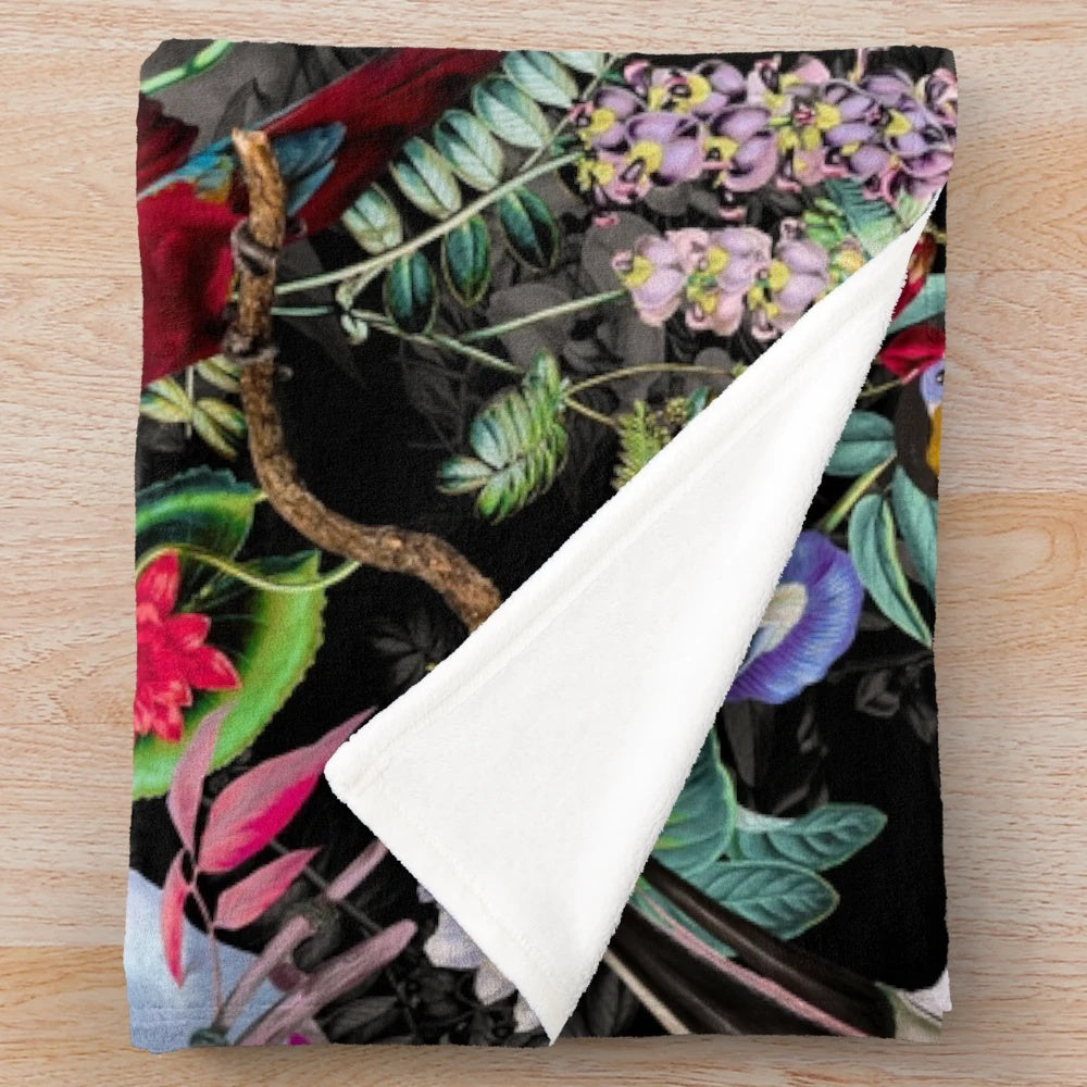 Floral and bird patterned plush blanket