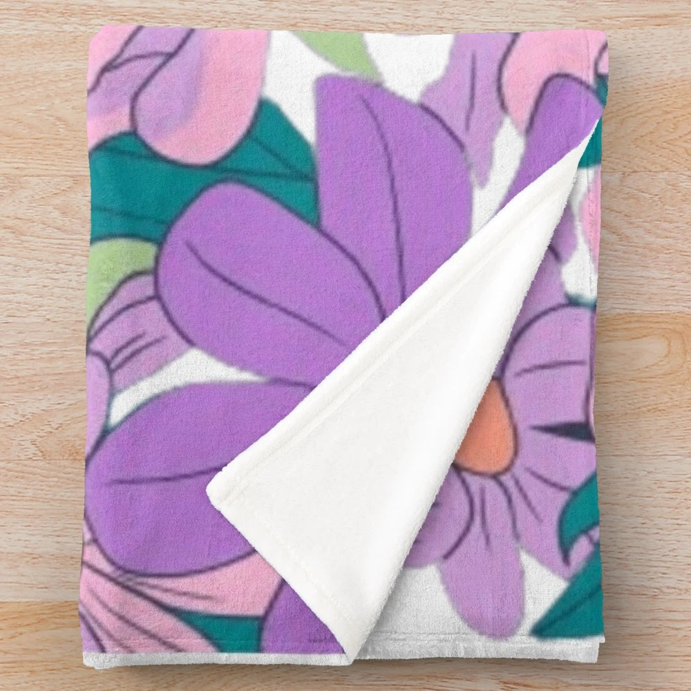 Vibrant floral pattern plush blanket with bright, energetic flowers and botanical designs