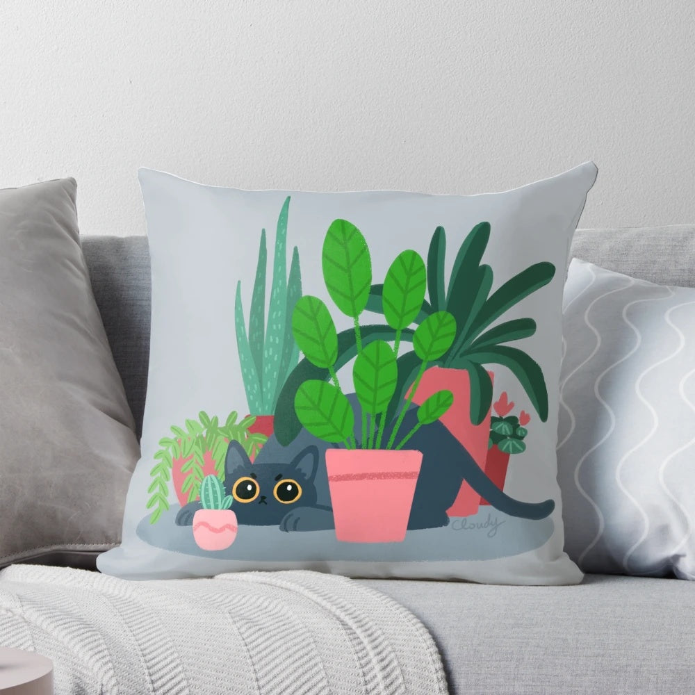 Decorative throw pillow featuring a bold, floral design with a playful black cat, perfect for cat lovers and home decor enthusiasts.