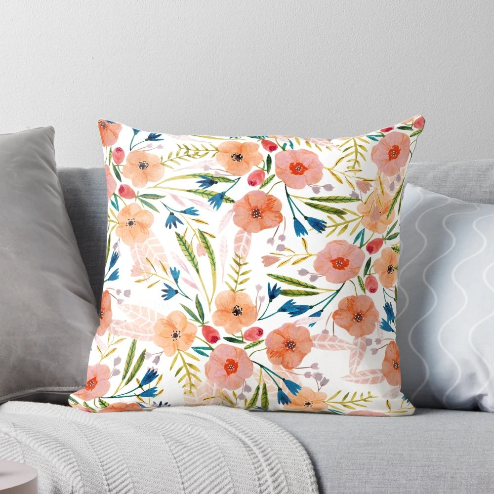 Floral dance pattern pillow featuring hand-painted summer flowers in pink, red, and orange hues