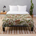Floral plush blanket with Jacobean embroidered pattern