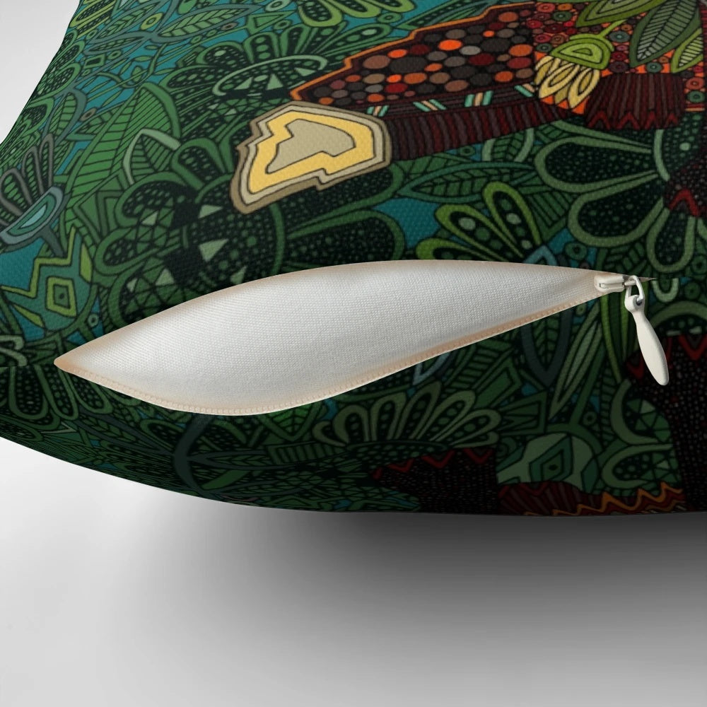 Colorful floral and fox motif decorative pillow with botanical and tribal patterns in teal, turquoise, and green